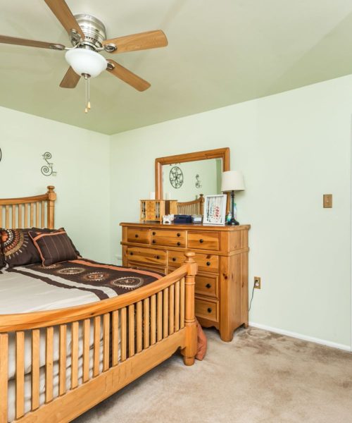 90 King Charles Circle bedroom 2 with ceiling fan