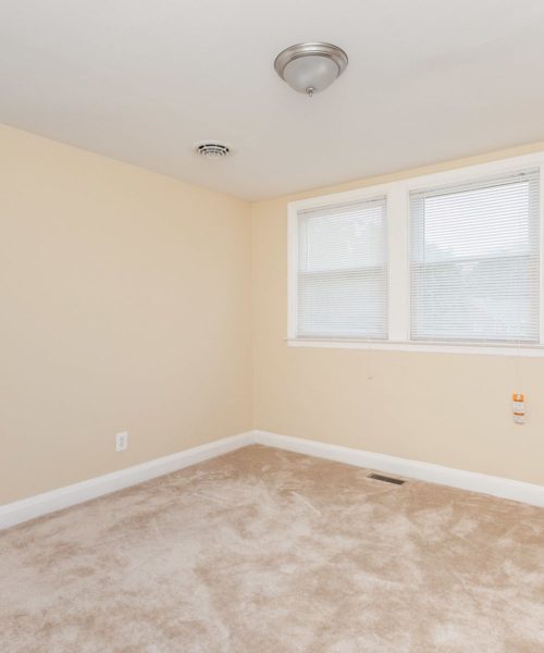 1021 East Lake Avenue carpeted bedroom