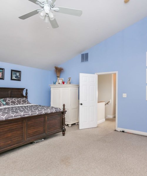 3919 Briar Point Road bedroom with ceiling fan