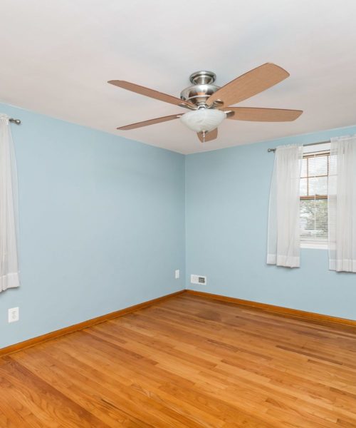 4416 Springwood Ave. bedroom with ceiling fan