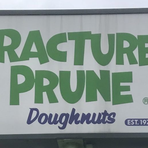 Fractured Prune Doughnuts sign