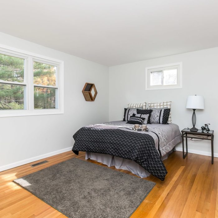 4416 Wynn Rd. bedroom hardwood with gray rug