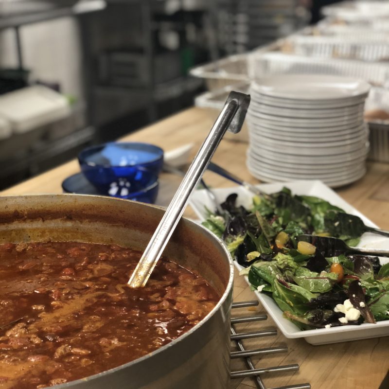 Feed the Community, chili with a side salad