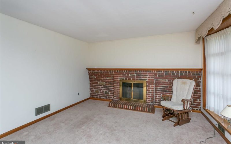 719 50th Street fireplace and wall of windows