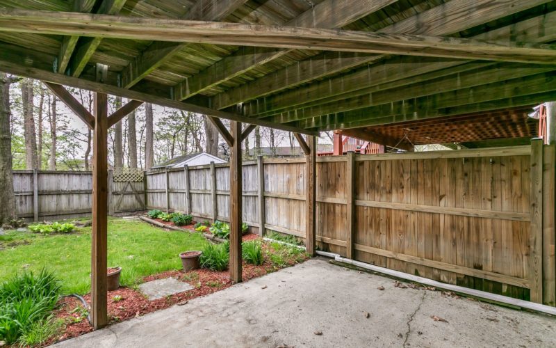 8673 Castlemill Circle, patio under deck with fenced yard