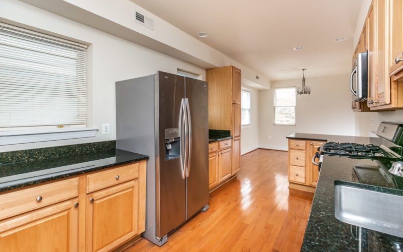 2012 Gough Street, kitchen with countertops and big refrigerator