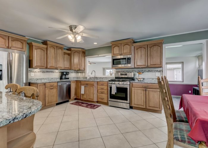 8134 Bullneck Road, spacious kitchen with ceiling fan