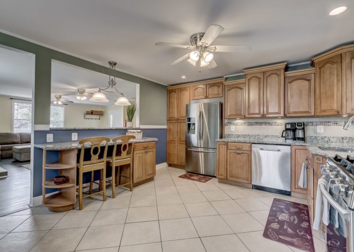 8134 Bullneck Road, spacious kitchen with granite countertops