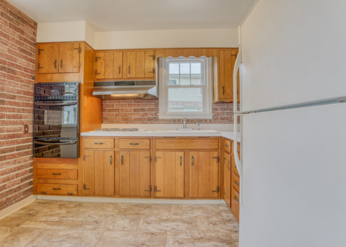 3306 Woodside Ave., kitchen with wooden cabinets