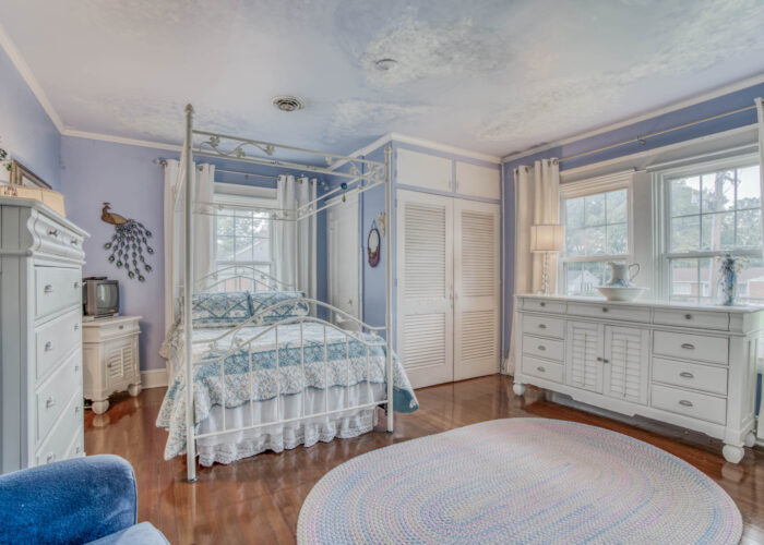 33 E. Seminary Avenue, blue bedroom with windows