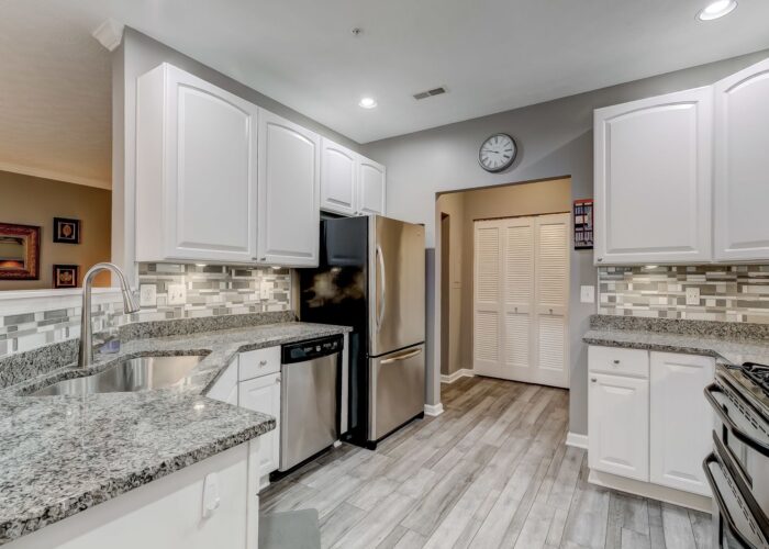 9505 Kingscroft Terrace #M, kitchen white cabinets
