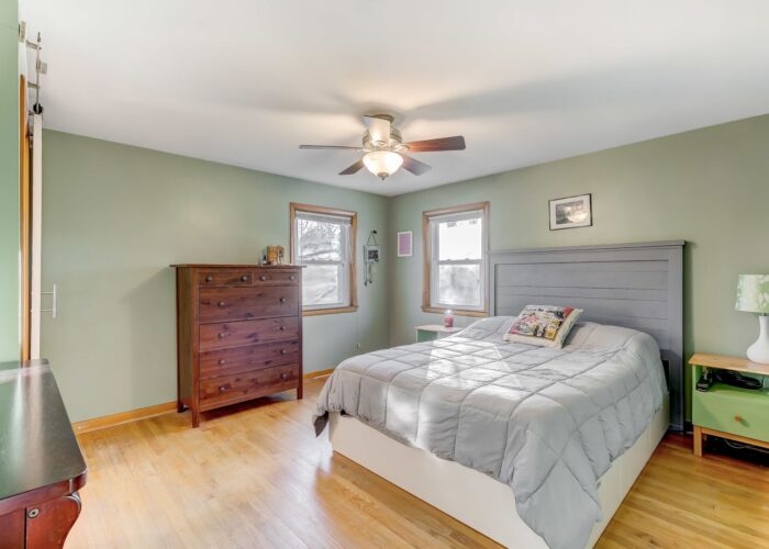 9502 Buckhorn Road, first bedroom with ceiling fan