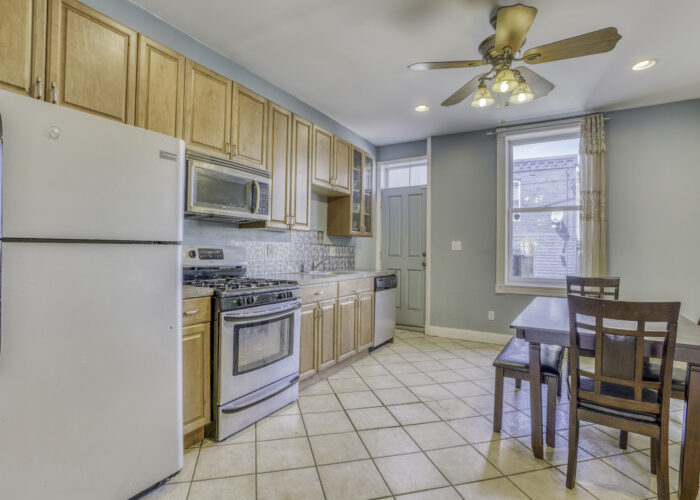 3304 E Baltimore St., kitchen with ceiling fan and dining area