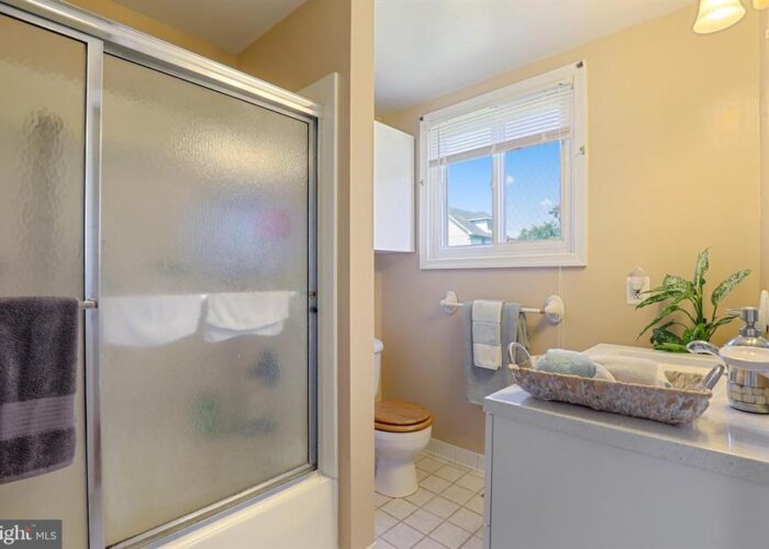 7312 Bay Front Road, bathroom showing stall shower
