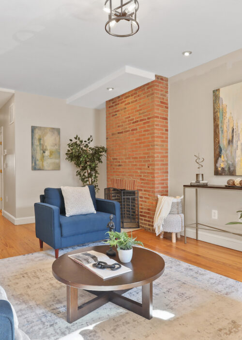 309 S Wolfe Street, living room with exposed brick