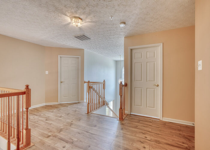 4900 Villa Point, hallway area showing bedroom doors