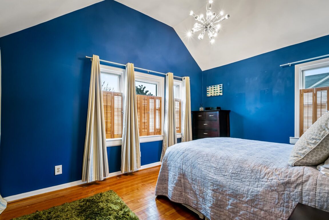 3307 Beverly Road, bedroom one with blue walls