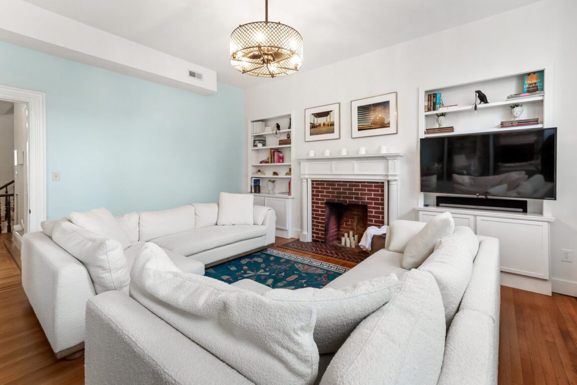 15 W Chase St, family room with golden ceiling light fixture.