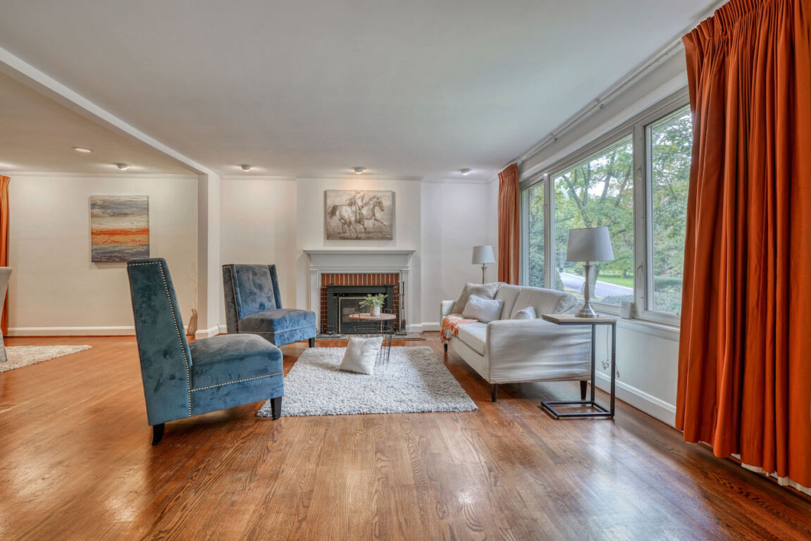 31 Millstone Road, living room with large windows and recessed lighting.