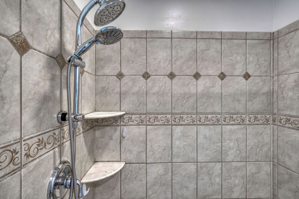 31 Millstone Road, shower with gray tile.