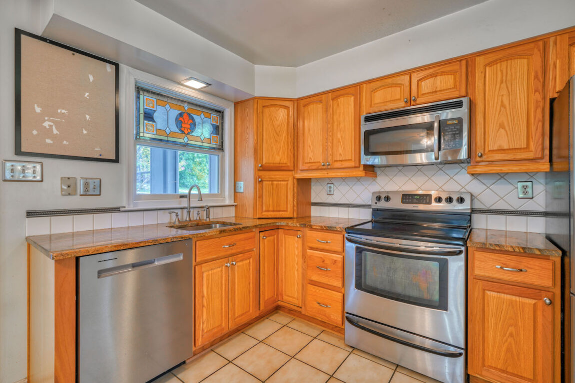 7512 Riddle Avenue, kitchen with stainless appliances.