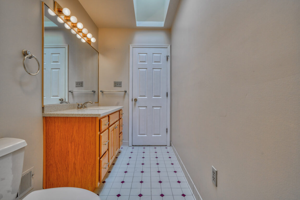 7512 Riddle Avenue, bathroom with tile floor.