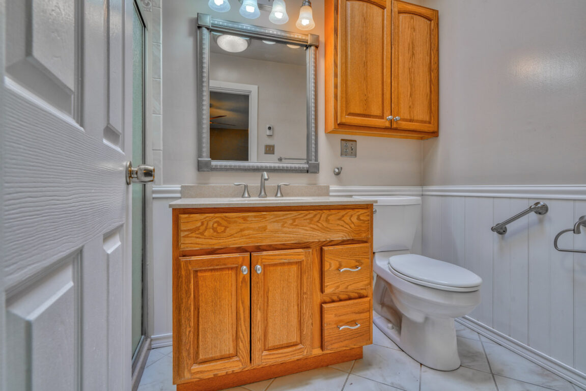 7512 Riddle Avenue, bathroom with handles by toilet.
