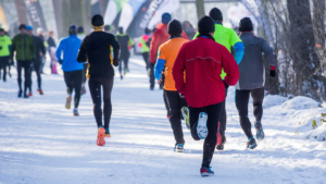 People running a race in the winter.