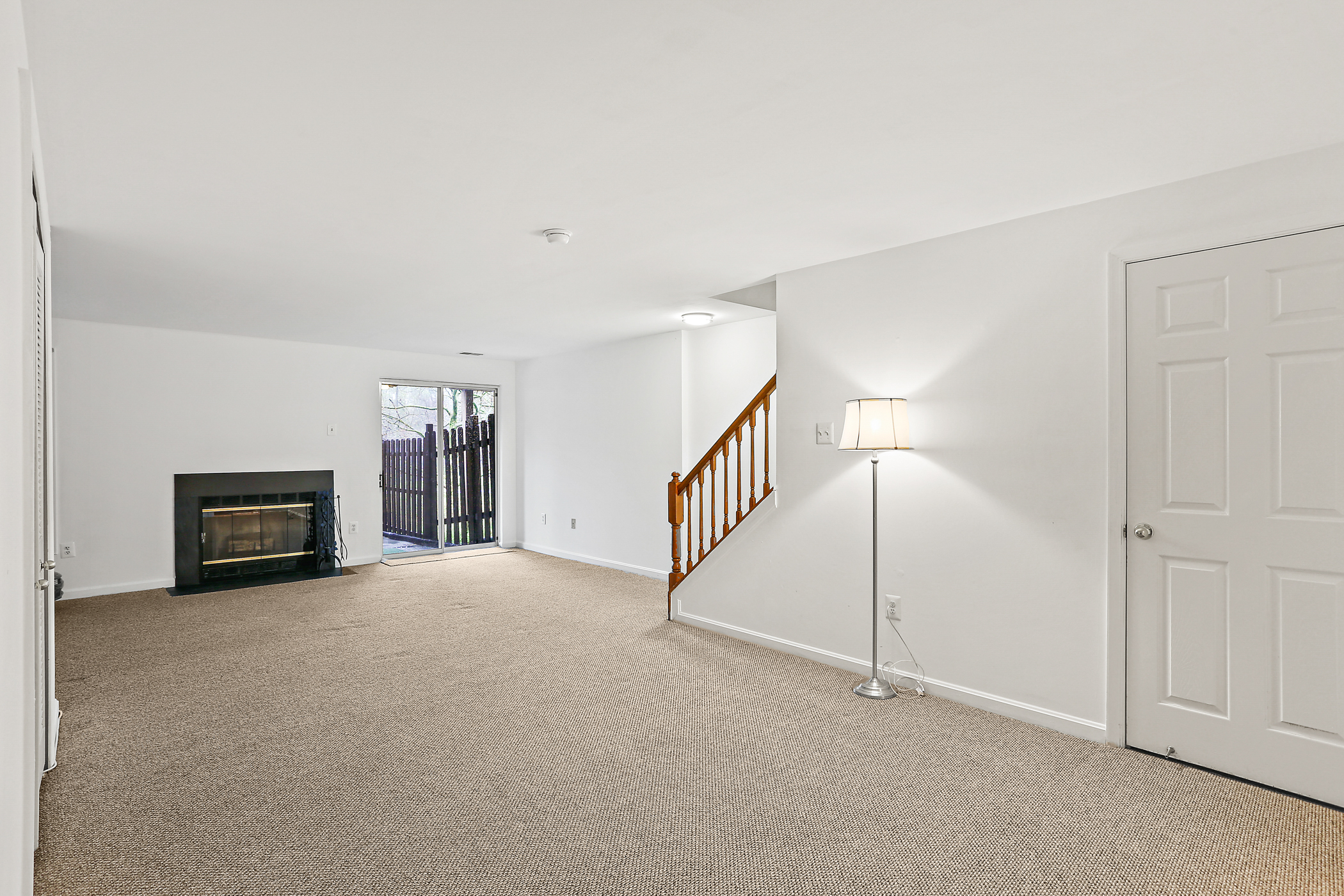 6203 Knolls Ct, lower level with fireplace.